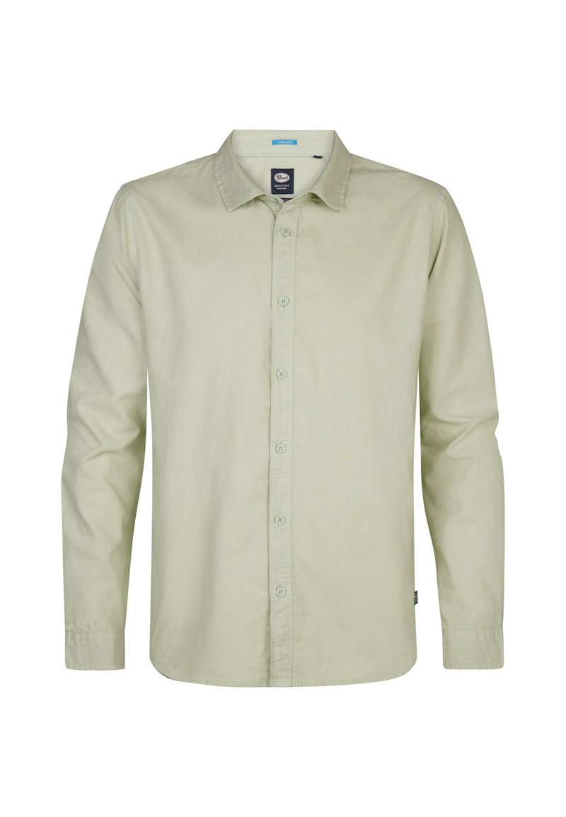 Camisa de manga larga verde claro, con botones en la parte delantera, cuello puntiagudo, textura suave y una etiqueta cerca del dobladillo inferior.