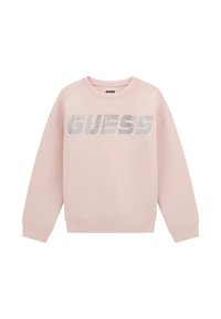 Sudadera rosa claro hecha de un material suave. Presenta un escote redondo y mangas largas con un logo brillante de "GUESS" en el frente.