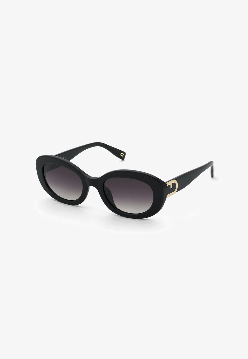 Lunettes de soleil ovales noires avec verres dégradés foncés et accents décoratifs dorés sur les branches, présentées sur fond blanc.