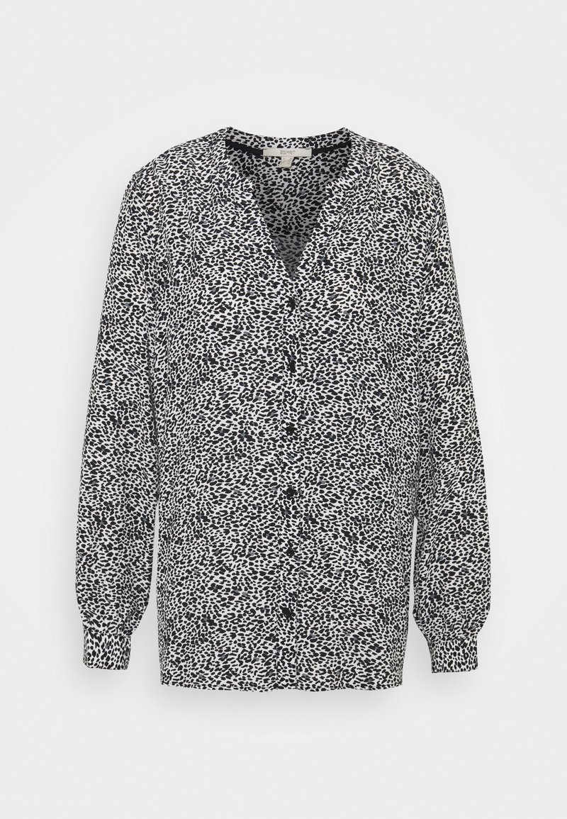 Langärmlige Bluse aus leichtem Stoff, mit einem schwarz-weißen Leopardenmuster, V-Ausschnitt und Knopfverschluss vorne. Puffärmel an den Manschetten.