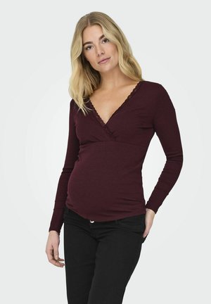 Top lung burgund cu mânecă lungă, de tip v-neck și cu dantelă; textură cu nervuri; design ajustat, potrivit pentru purtarea în timpul sarcinii.