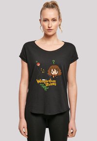 Black short-sleeve t-shirt featuring a cartoon graphic with the text "Wingardium Leviosa" in orange and green, and character illustrations.