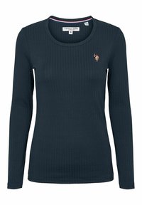 Długie rękawy, prążkowany top w ciemnoniebieskim kolorze z okrągłym dekoltem oraz małym haftowanym logo na lewej piersi. Miękki, elastyczny materiał.