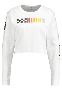 Vit kortärmad långärmad skjorta i mjukt tyg. Har en flerfärgad rutad grafik på framsidan och en grafisk design på vänster ärm.