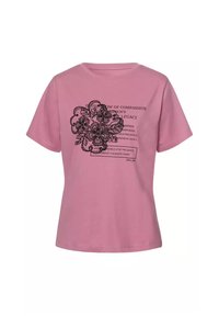 Różowa bawełniana koszulka z czarną grafiką kwiatową i napisem. Krótkie rękawy, okrągły dekolt i luźny krój.