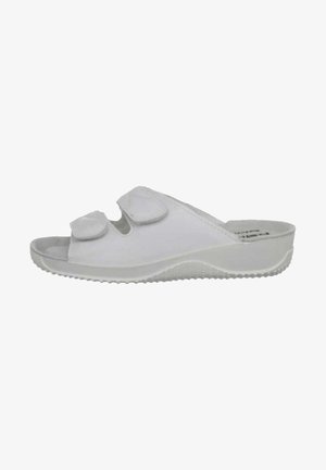 White slide sandal with a smooth upper, two adjustable velcro straps, and a textured rubber sole for traction. Lightweight design.