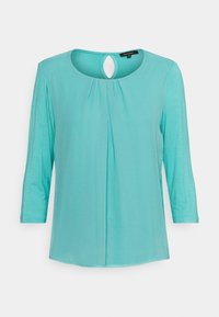 Turkos blus med långa ärmar och veckad frontdetalj samt nyckelhålsöppning, storlek 36, mjukt och lätt material.