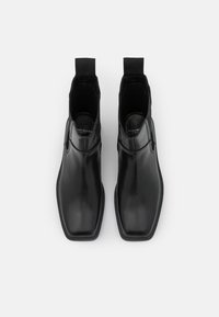 Vagabond Kotníkové boty na platformě - black