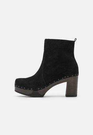 Botines con plataforma - black