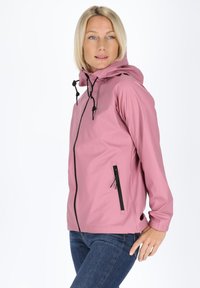 Pink waterproof jacket with a hood, black zippers, adjustable drawstrings, and a fitted design. Smooth texture and lightweight material.