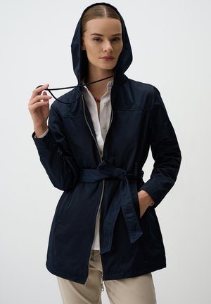Navy blue lightweight jacket with a hood, drawstring, and belted waist; features zip closure and side pockets; smooth texture.