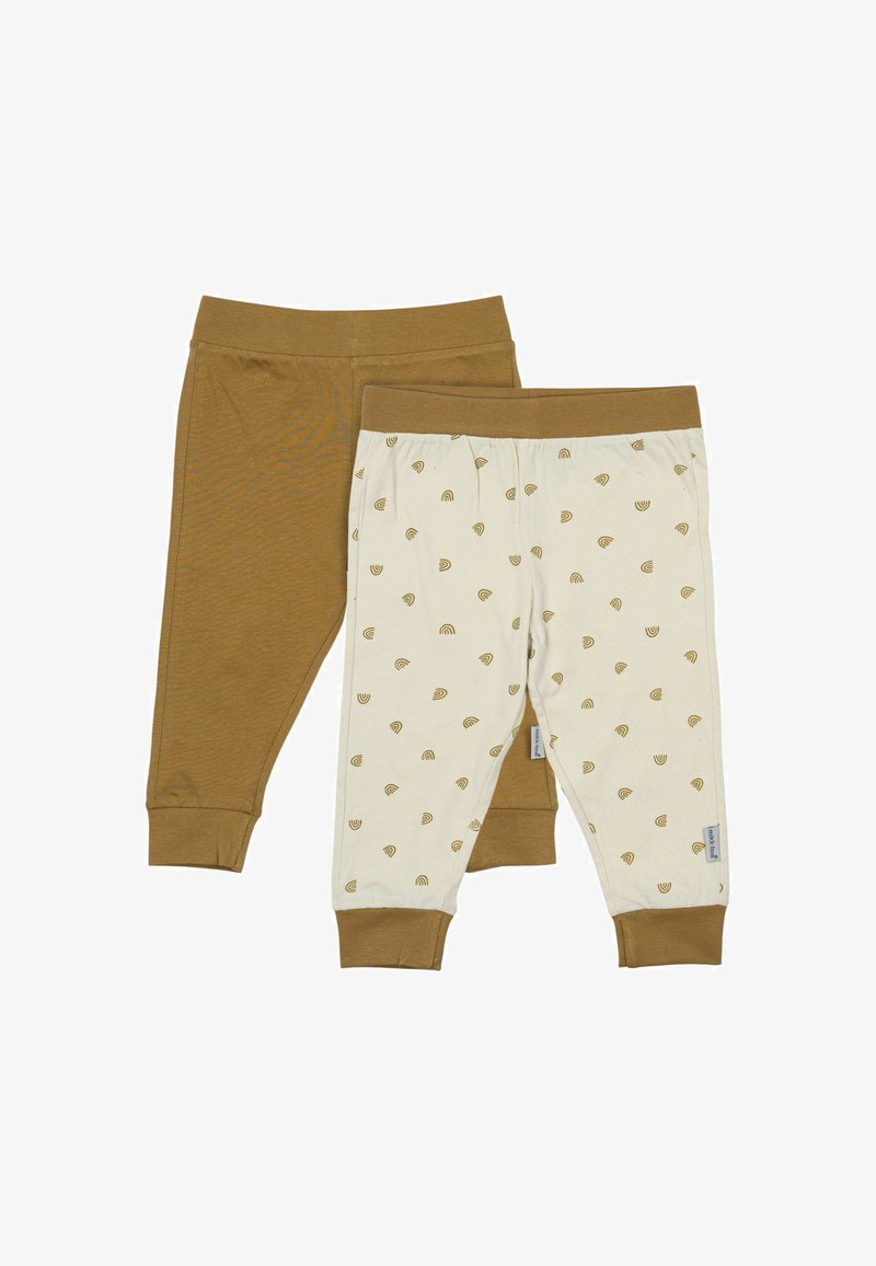 Zwei Paar weiche Baumwollhosen: eine einfarbig braun, die andere cremefarben mit kleinen braunen Regenbogenmustern. Beide haben umgenähte Säume und elastische Taillenbünde.