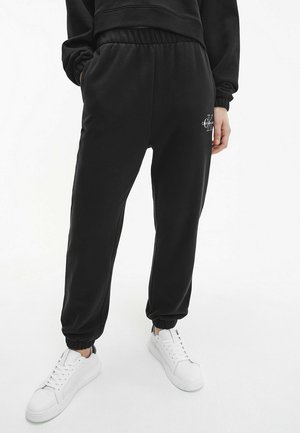 RELAXED MONOGRAM - Tracksuit bottoms - ck black