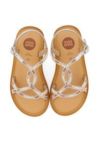 Sandali in pelle con tomaia beige caratterizzati da cinturini intrecciati e decorati con piccoli strass, e suola marrone chiaro. Taglia 26.