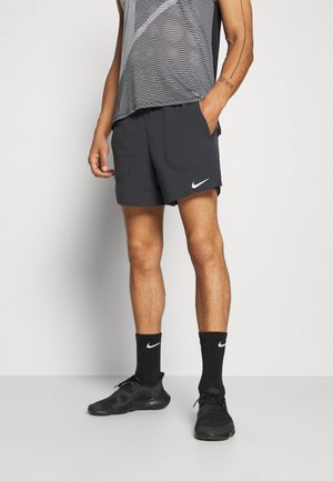 STRIDE SHORT - Pantaloncini sportivi - black