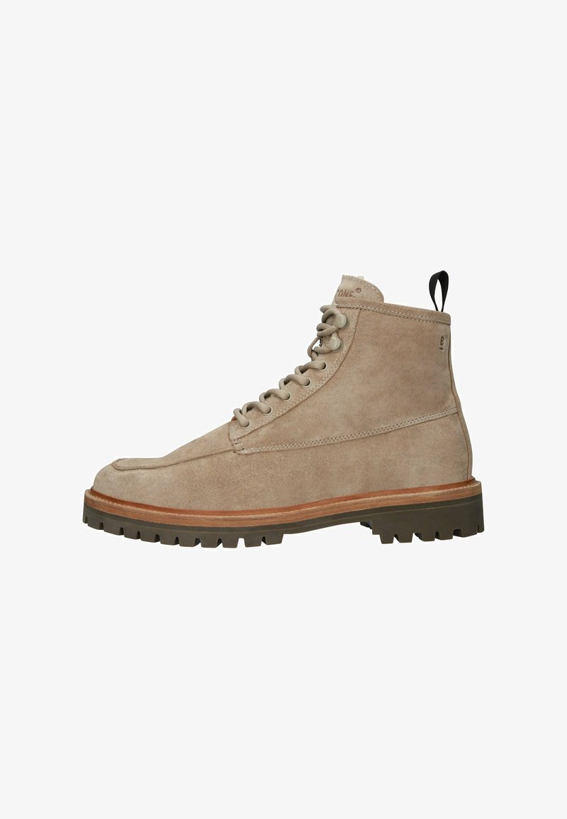 Šviesiai rudos nubuko auliukai su apvaliu pirštu, su raišteliais priekyje, guminis padas ir kilpa gale. Iškirtinė siuvimo detalė palei siūles.