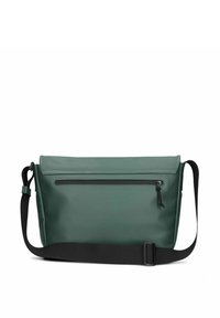 Borsa a tracolla verde con cinturino nero regolabile e tasca con zip frontale, progettata per l'uso quotidiano.