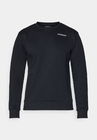 Zwarte sweatshirt met lange mouwen en ronde hals, voorzien van een klein wit Kappa-logo op de bovenste linkerborst, met ribgebreide manchetten en tailleband.