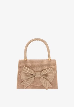 Beige håndtaske med struktureret krop, tekstureret stof dekoreret med små metalnitter og en stor sløjfeaccent på forsiden.