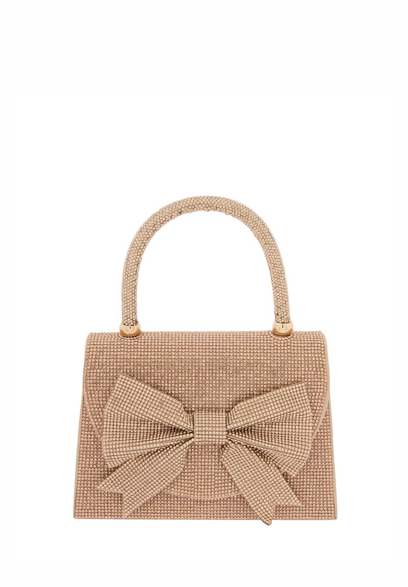 Beige handbag with structured body, textured fabric embellished with small metallic studs, and a large bow accent on the front.