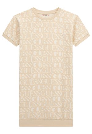 Robe beige à manches courtes avec un motif en répétition de logo "GUESS" sur l'ensemble. Fabriquée dans un matériau doux avec un col rond côtelé et des poignets.