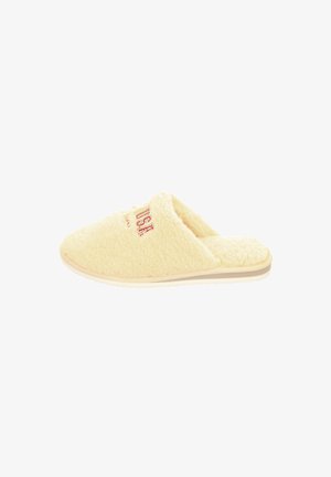 Yellow fluffy slippers with a soft texture, open toe design, and a stitched "USA" logo on the upper side. Lightweight sole.