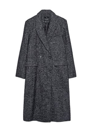 Cappotto doppiopetto in un motivo a spina di pesce bianco e nero, realizzato in tessuto testurizzato, con colletto a rever e tasche laterali.