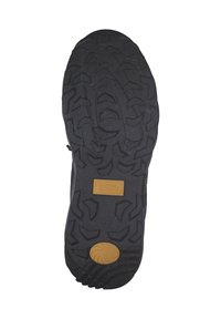Semelle de botte de randonnée noire avec un profond motif de crampons, détail de prise circulaire jaune près du talon, et marquage "Camel Active" au centre.
