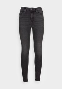 Vaqueros skinny negros de denim, con una cintura de altura media, cinco bolsillos, ligeros desgastes en los muslos y un cierre de cremallera/botón.