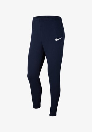 Marineblauwe sportleggings gemaakt van zachte stof, met een taps toelopend ontwerp, elastische tailleband en een wit Nike-logo op de linker bovenbeen.