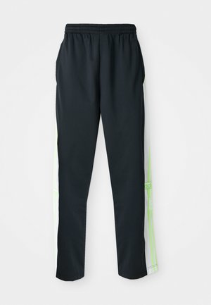 Pantaloni sportivi neri con una vestibilità rilassata, vita elastica e strisce laterali bianche con dettagli in verde neon; tessuto liscio e leggero.