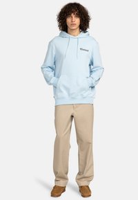 Light blue hoodie made of soft fabric, featuring a central kangaroo pocket, drawstrings, and "Element" logo embroidered on the chest.