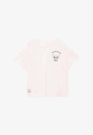 T-shirt en coton rose clair à manches courtes, avec un col rond, présentant un imprimé graphique d'un personnage et le texte "LES CÂLINS SONT LES MEILLEURS."
