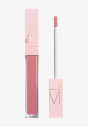 Pink liquid lipstick with gold lettering, shown closed and with applicator wand beside it on a white background.