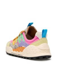 Multicolored sneaker featuring a mix of materials, including suede and mesh, with a textured sole, unique stitching, and a pull tab.