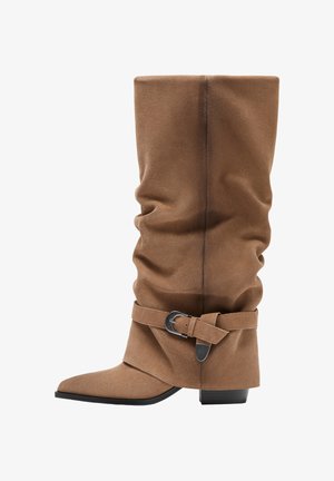 - Kowbojki i obuwie motocyklowe