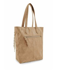 Beige draagtas met een gestructureerde, imitatieleren afwerking. Voorzien van een voorvak met ritssluiting en decoratieve kettingdetails. Voorzien van twee stevige handvatten.