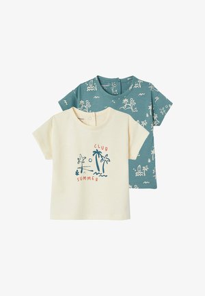 Two short-sleeve toddler t-shirts, one cream with palm tree and "Club Summer" text, one teal with white island and ocean pattern.
