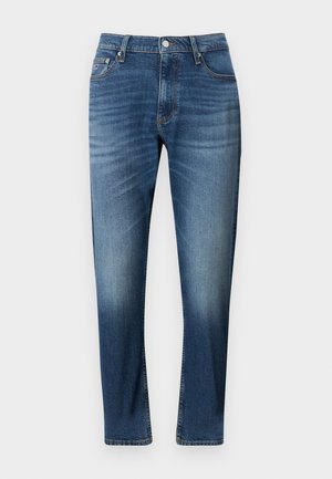 Blue denim jeans with a straight leg design, featuring faded detailing, five-pocket styling, and a button fly closure.