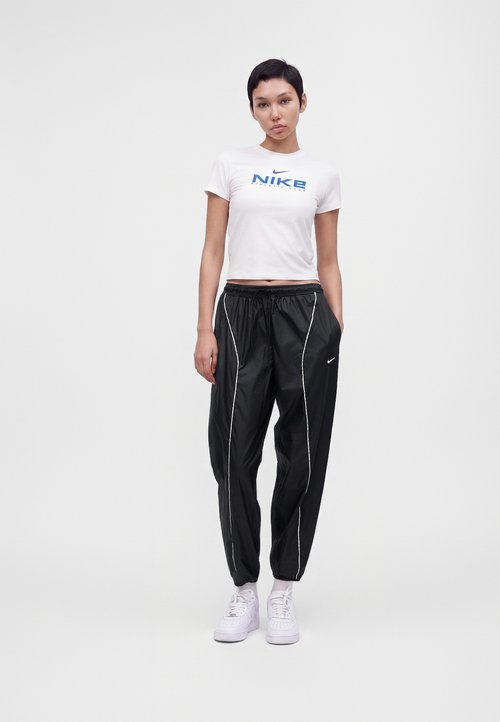 Nike ATHLETICS - Tracksuit bottoms - black/sail — foto 2