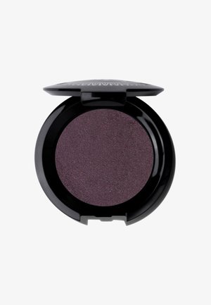 Round eyeshadow compact made of black plastic, containing a deep purple shade with shimmering texture. Lid features a decorative pattern.