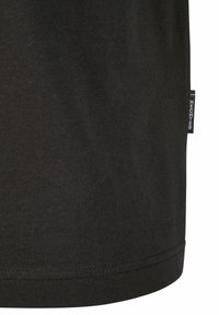 Black cotton t-shirt with a textured finish, featuring a small label on the side hem with "HECHTER" in contrasting colors.