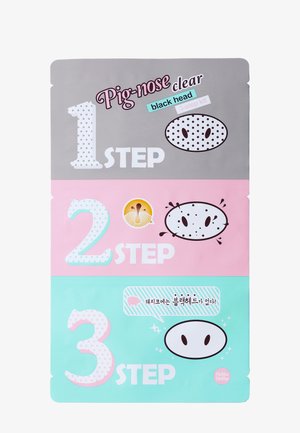 Emballage du kit en trois étapes Pig-nose pour éliminer les points noirs avec étapes numérotées et illustrations de nez sur des fonds gris, rose et bleu.