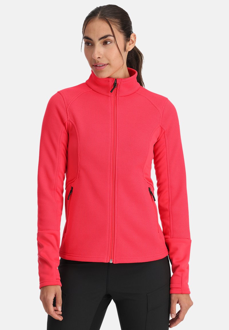 Felle roze ritsjack met ribbeltextuur, hoge kraag en zijzakken. Lange mouwen met contrasterende gladde stof bij de manchetten.