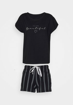 Black cotton t-shirt with cap sleeves featuring “YOU ARE Beautiful” text. Black and grey striped shorts with drawstring waist.
