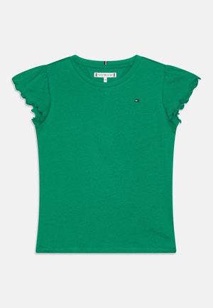 Grünes kurzärmeliges Mädchent-Shirt mit Rüschenärmeln und kleinem Tommy Hilfiger-Logo auf der Brust.