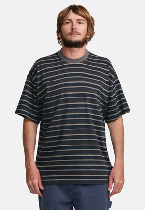 Striped short-sleeve t-shirt in navy with thin cream and gray stripes, featuring a round neckline and loose fit. Soft fabric texture.