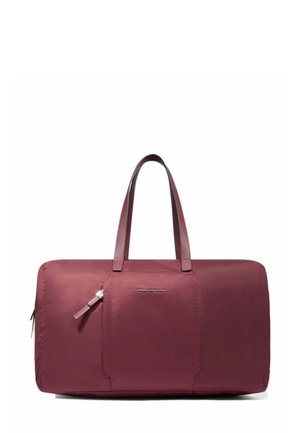 Large rectangular burgundy travel bag with dual handles, front zipper pocket, and "Piquadro" logo on a plain white background.