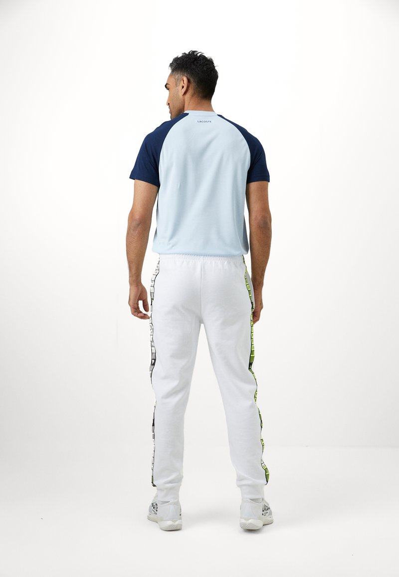 Lacoste Sport TENNIS PANT Pantalon de survêtement white/blanc