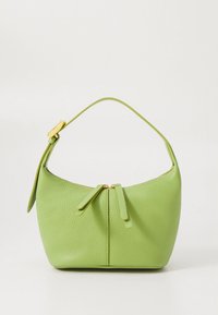 Green leather handbag with a rounded shape, single strap, gold zipper, and front ties for closure. Textured surface and minimalist design.